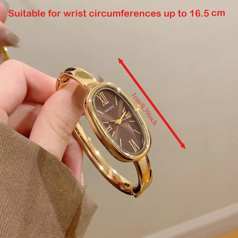 Montre Femme Ovale à Quartz avec Chiffres Romains – Bracelet Doré Élégant