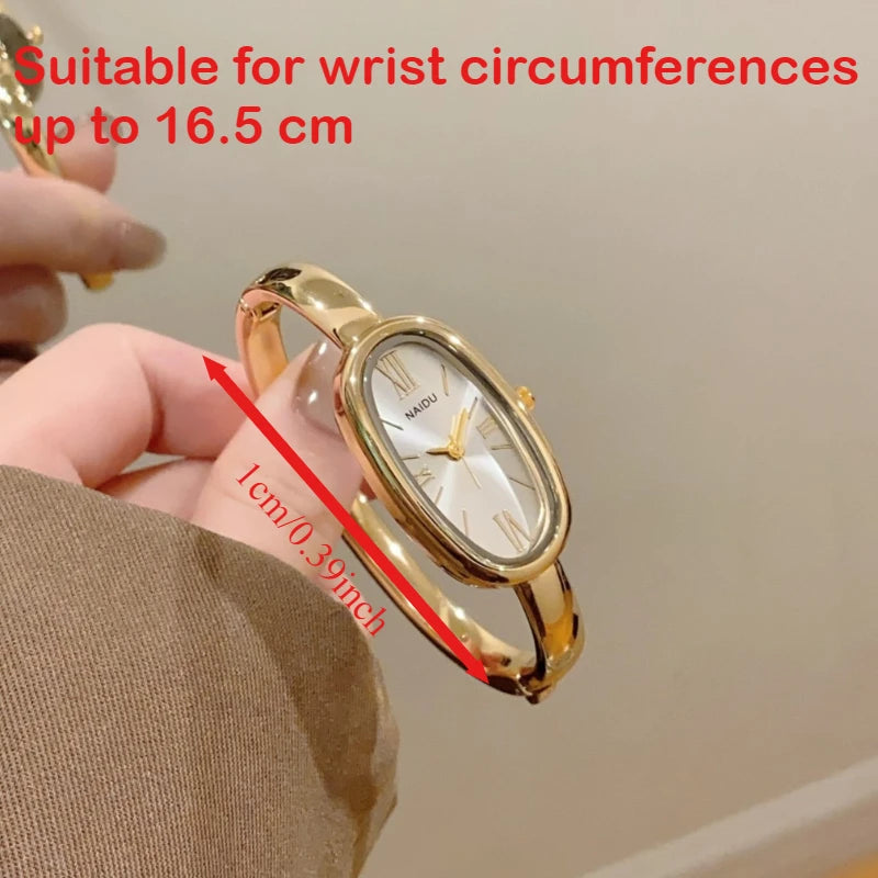 Montre Femme Ovale à Quartz avec Chiffres Romains – Bracelet Doré Élégant
