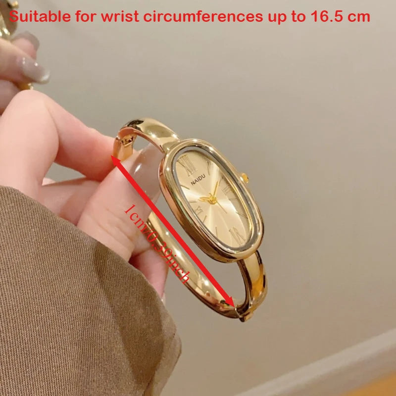 Montre Femme Ovale à Quartz avec Chiffres Romains – Bracelet Doré Élégant