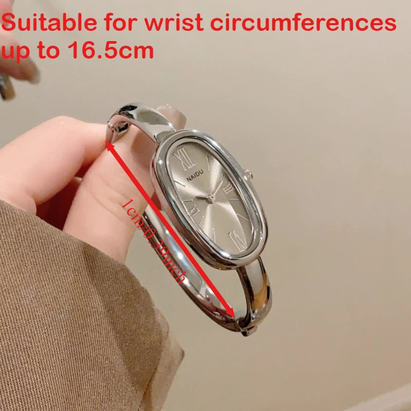 Montre Femme Ovale à Quartz avec Chiffres Romains – Bracelet Doré Élégant